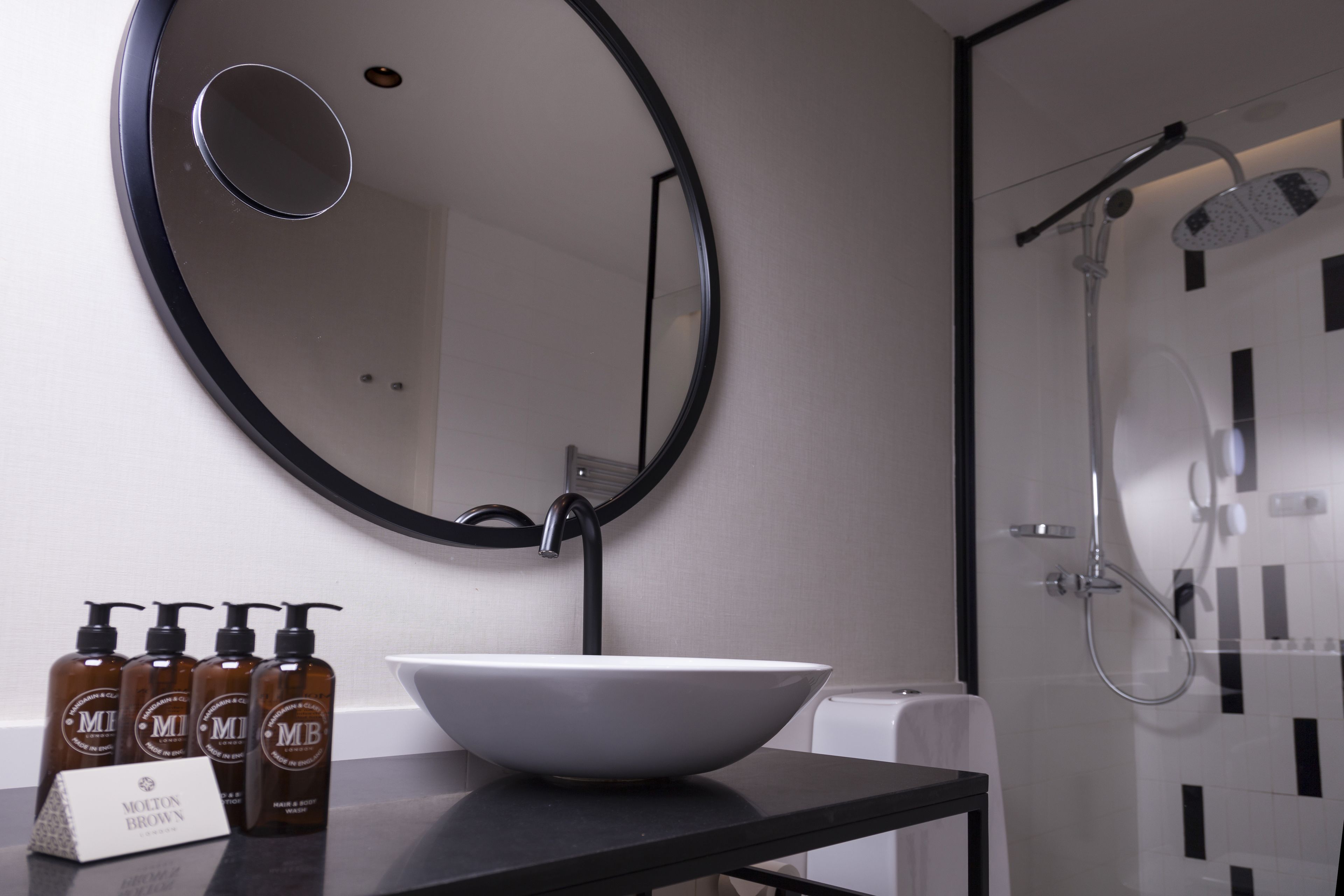 superior double room, city view | bathroom | shower, rainfall showerhead, designer toiletries, hair dryer