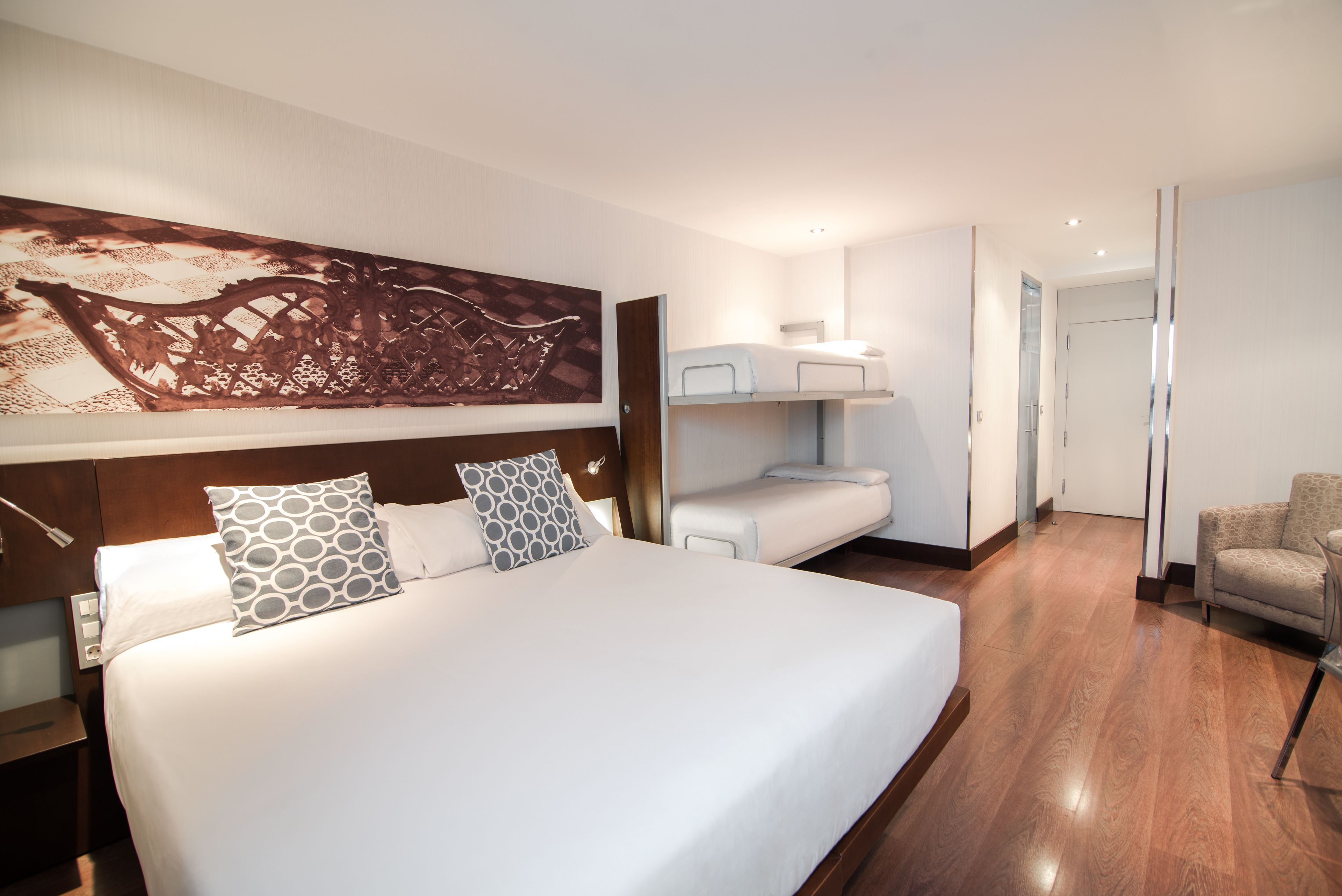 quadruple room | minibar, in-room safe, desk, blackout curtains