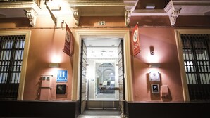 A hotel entrance with a glass door, a sign for 'Marques Santa Ana', and a 'First' sign indicating a first-floor location. - Petit Palace Marqués Santa Ana (Seville)