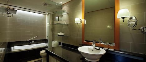 A modern bathroom with a large mirror, a bathtub, a sink, and shelves with toiletries.