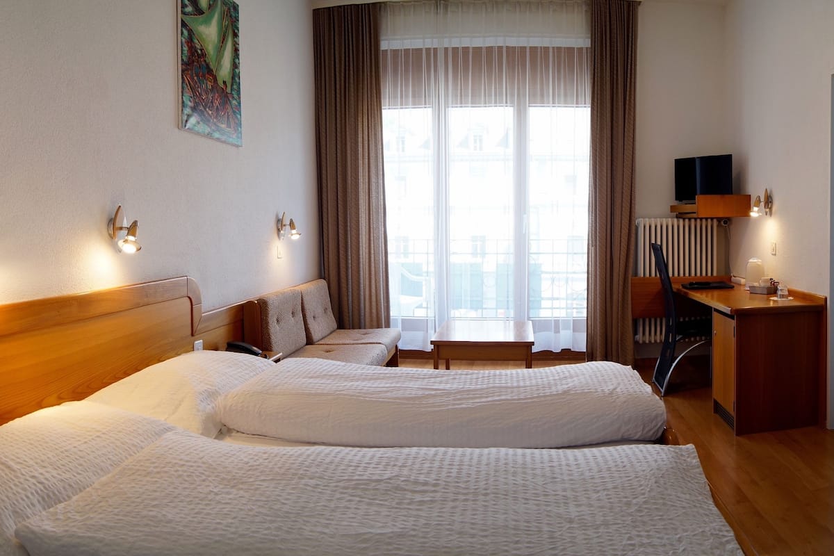 double room, bathtub | in-room safe, desk, laptop workspace, soundproofing