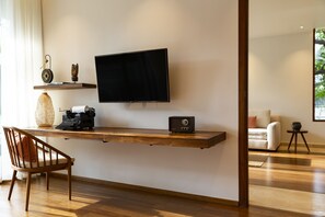 43-inch flat-screen TV with cable channels, TV