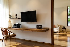 43-inch flat-screen TV with cable channels, TV