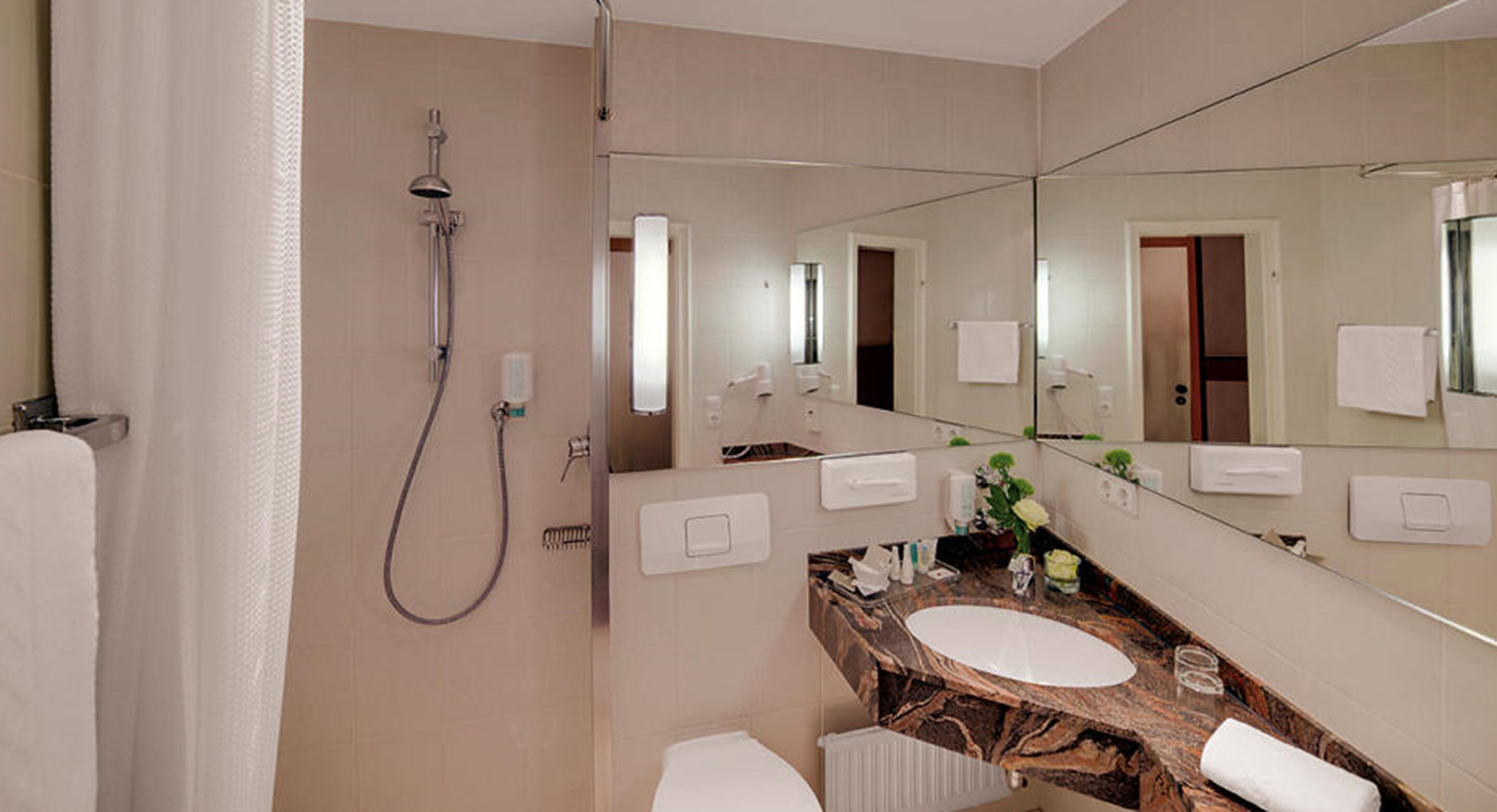 deep-soaking bathtub, free toiletries, hair dryer, towels