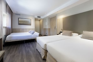 Quadruple Room | Down comforters, pillowtop beds, in-room safe, desk