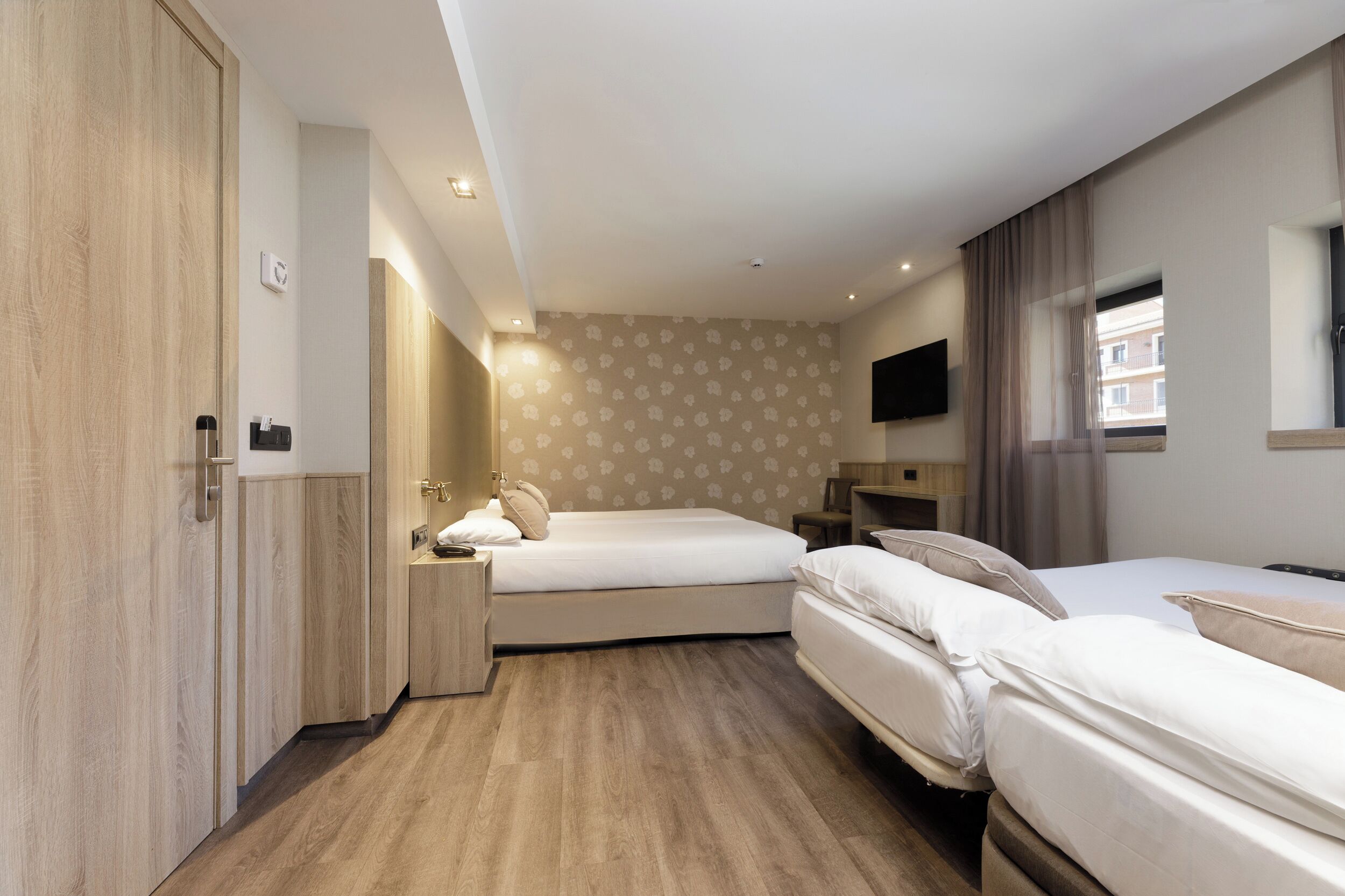 Quadruple Room | Down duvets, pillow-top beds, in-room safe, desk