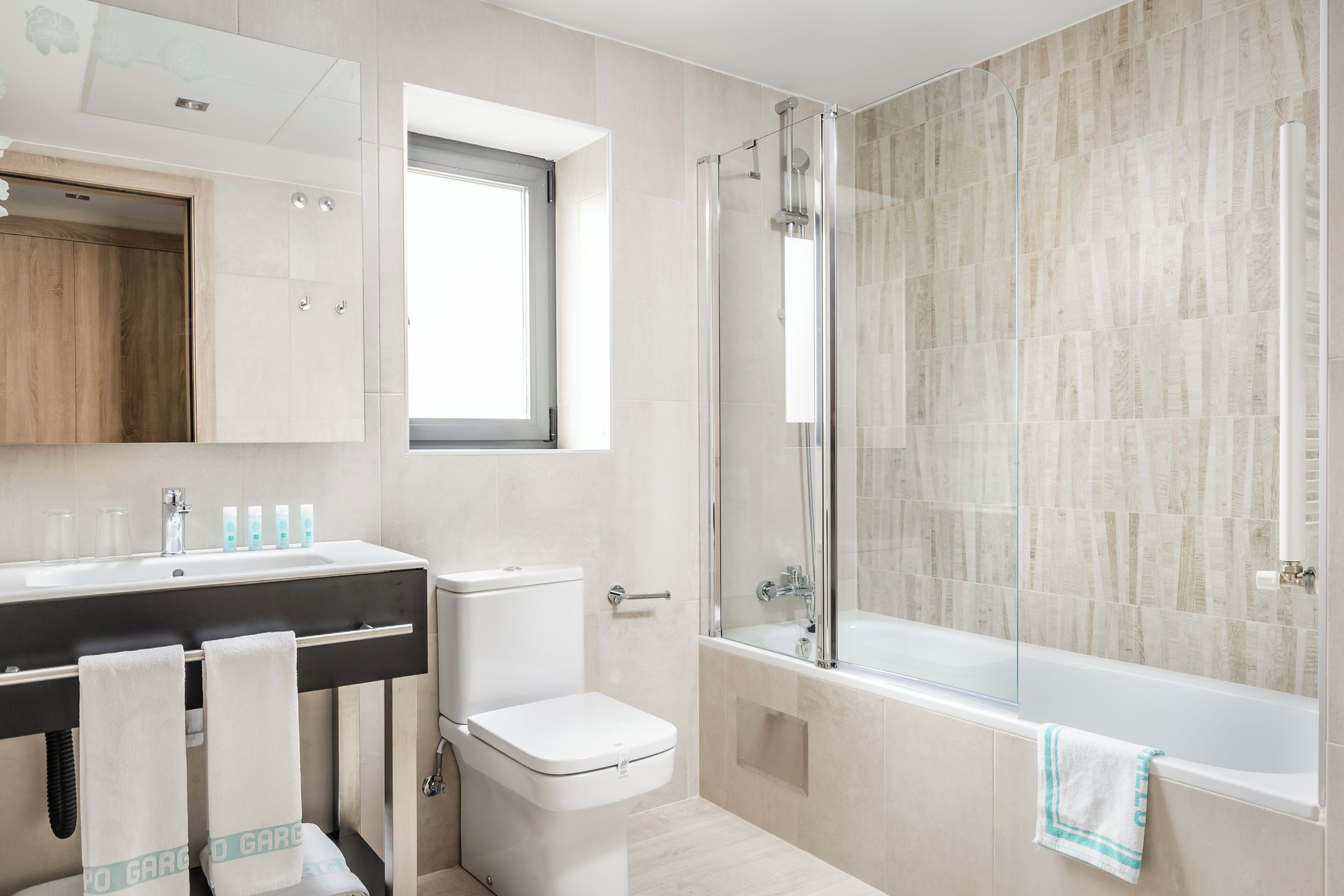 quadruple room | bathroom | eco-friendly toiletries, hair dryer, towels, soap
