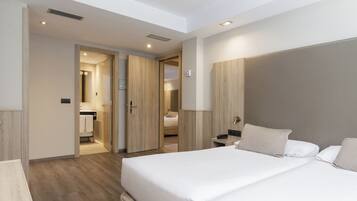 Down duvets, pillow-top beds, in-room safe, desk