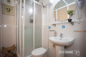 Twin Room, Private Bathroom | Bathroom | Hair dryer, towels