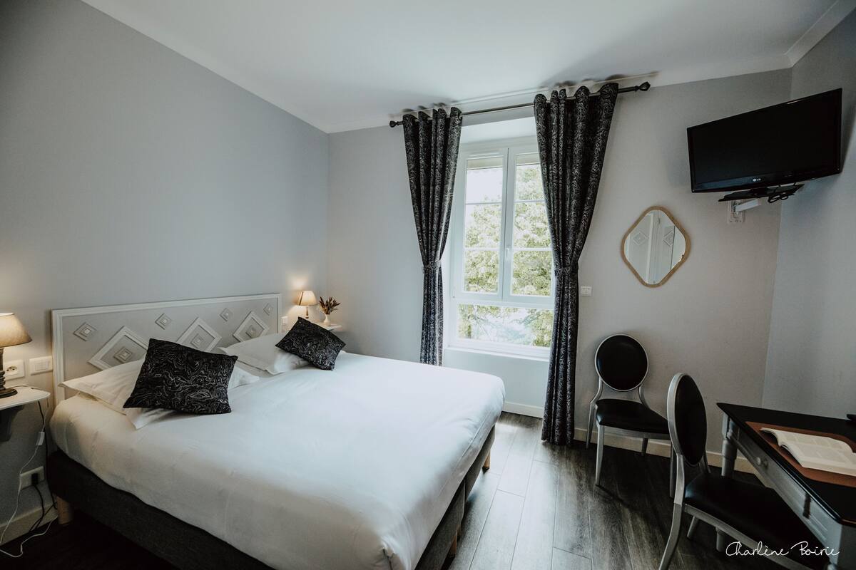 Habitación Confort doble | Cortinas opacas, sistema de insonorización, wifi gratis