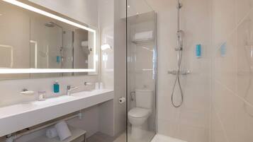 Shower, rainfall showerhead, designer toiletries, hair dryer