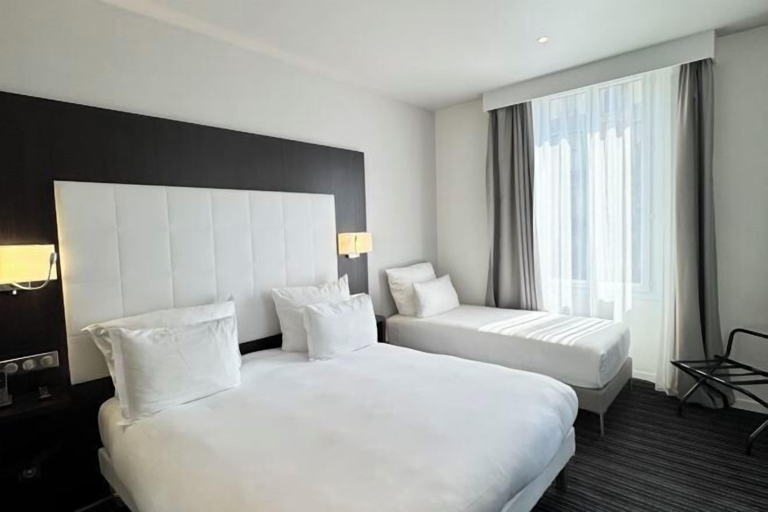 Premium bedding, down comforters, pillowtop beds, in-room safe