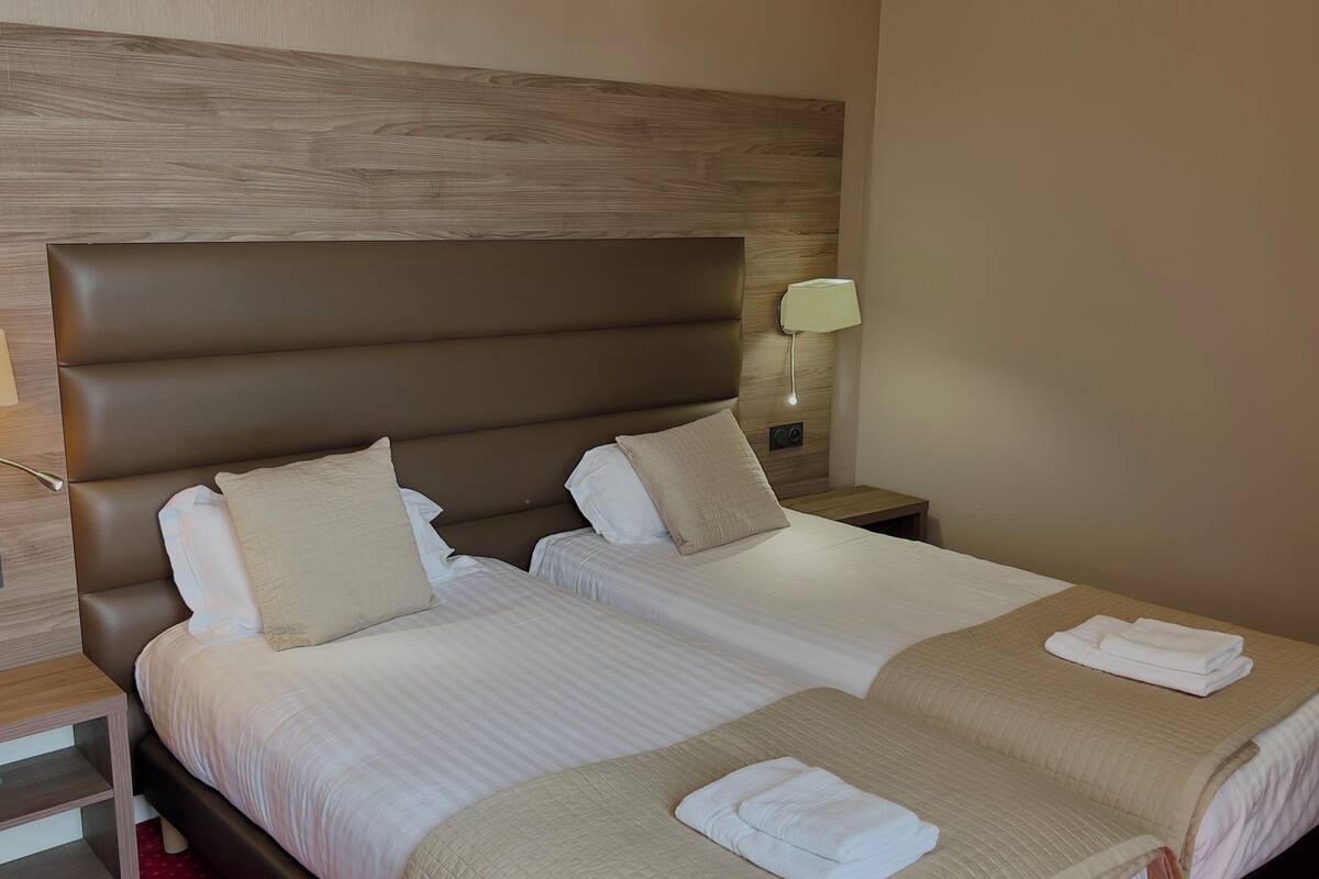 superior double room | frette italian sheets, premium bedding, down duvets, pillow-top beds