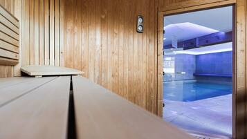 Indoor pool, open 10:00 AM to 8:00 PM, pool loungers
