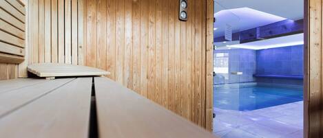 Indoor pool, open 10:00 AM to 8:00 PM, pool loungers