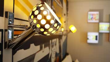 A wall-mounted light fixture with multiple bulbs.
