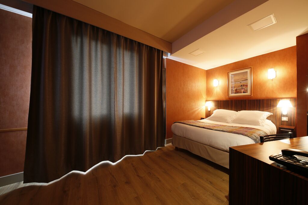 classic quadruple room, 1 bedroom | premium bedding, desk, laptop workspace, blackout curtains