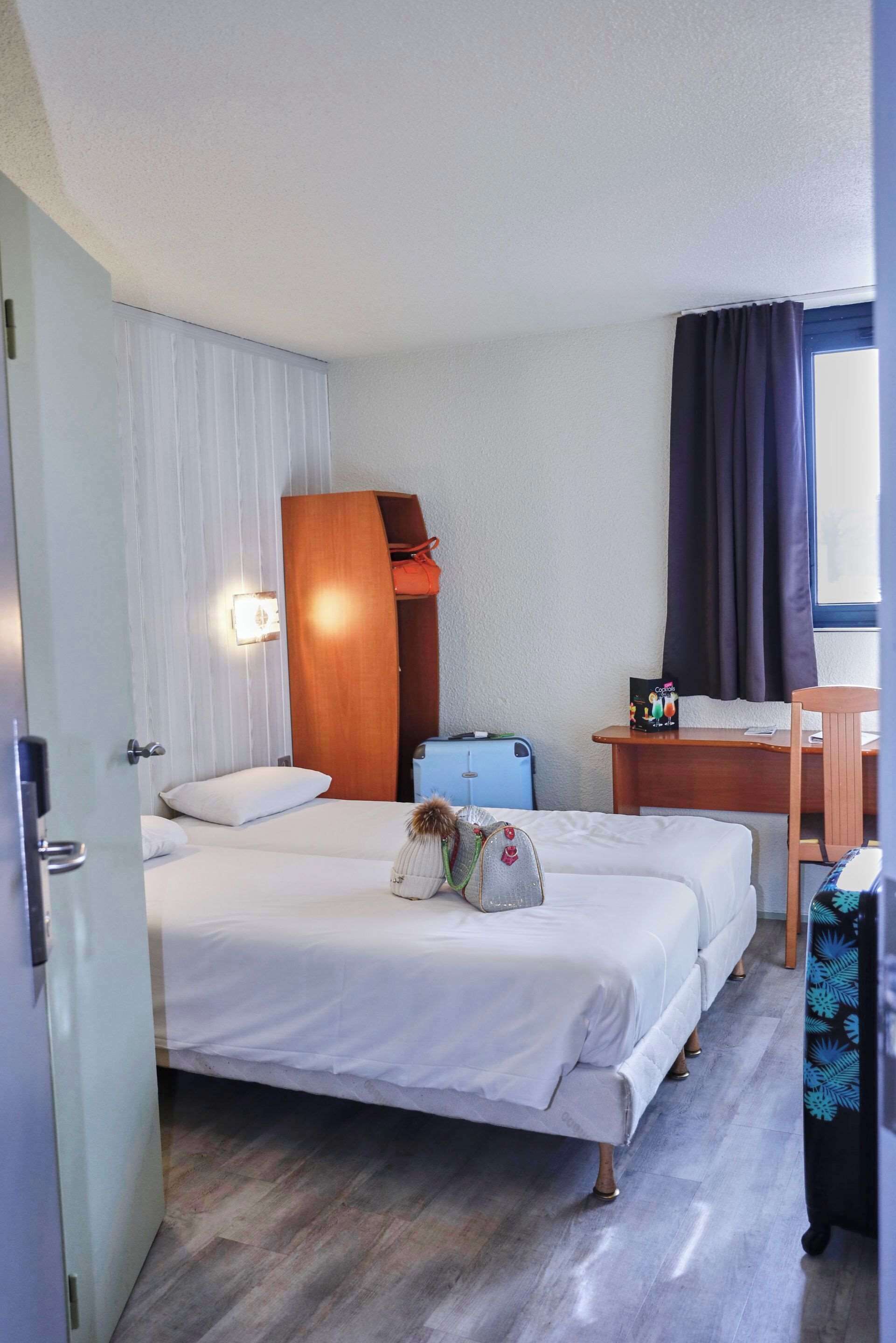 desk, blackout curtains, soundproofing, iron/ironing board