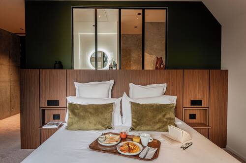 Deluxe Room, Partial Sea View | Premium bedding, laptop workspace, blackout curtains, soundproofing