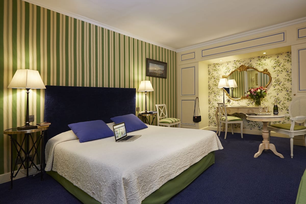 Deluxe Suite, 1 Queen Bed, Terrace | Premium bedding, minibar, in-room safe, individually decorated
