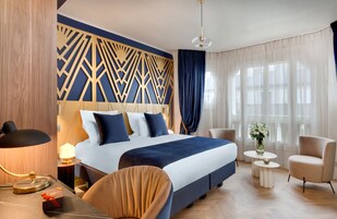 Escritorio, sistema de insonorización, wifi gratis y ropa de cama 