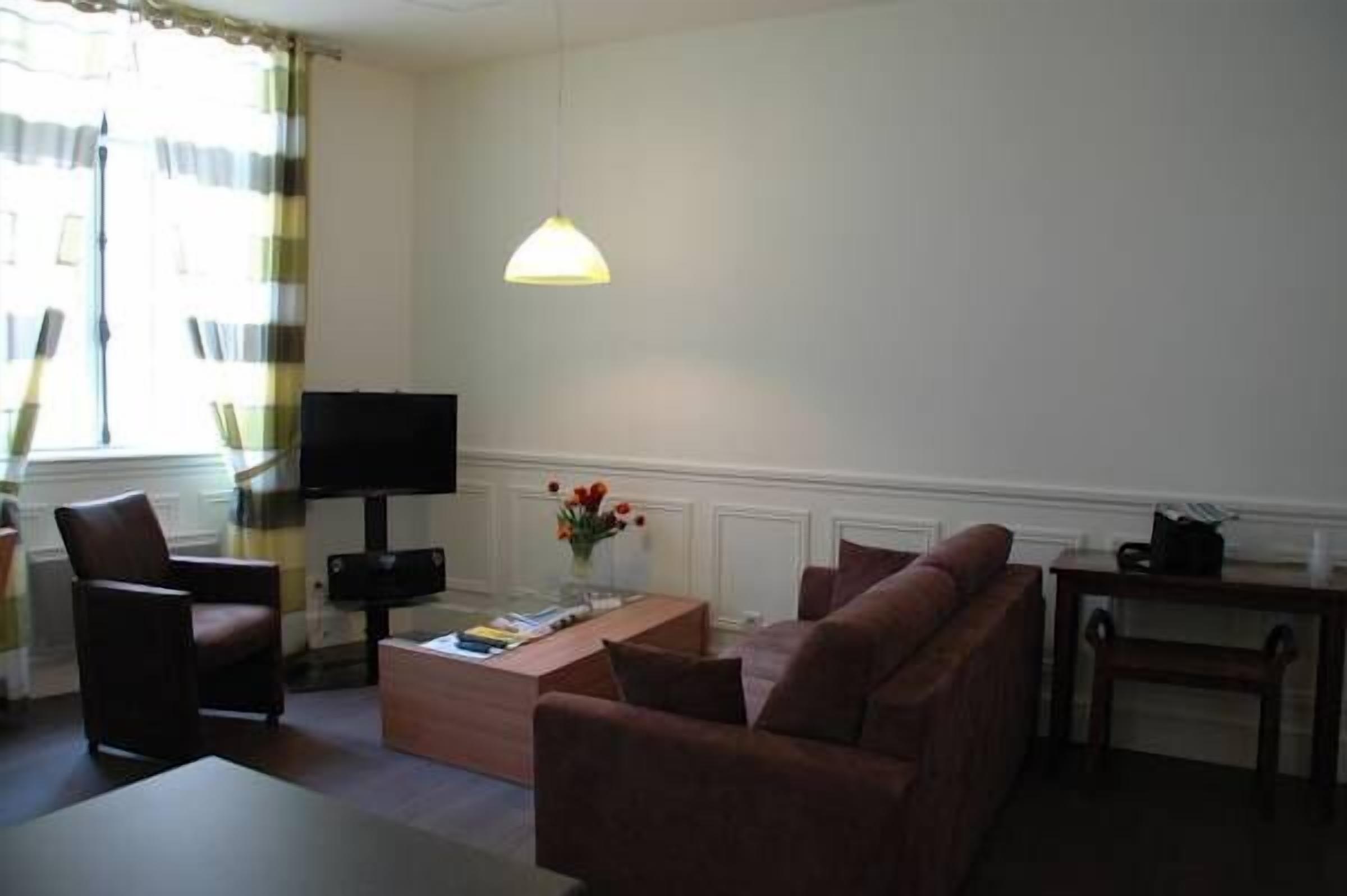 superior apartment, 2 bedrooms, city view | living room | flat-screen tv, ipod dock