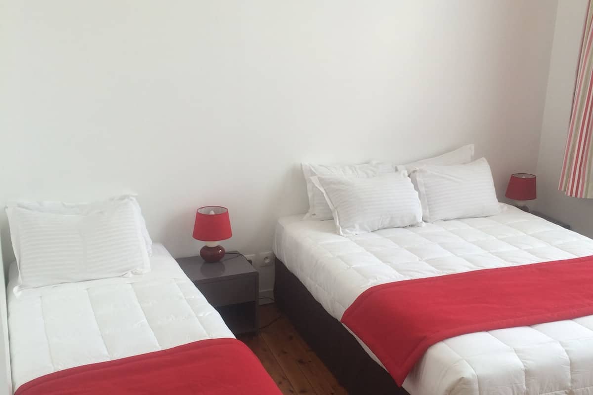 comfort apartment, 1 bedroom, city view | premium bedding, down duvets, blackout curtains, soundproofing