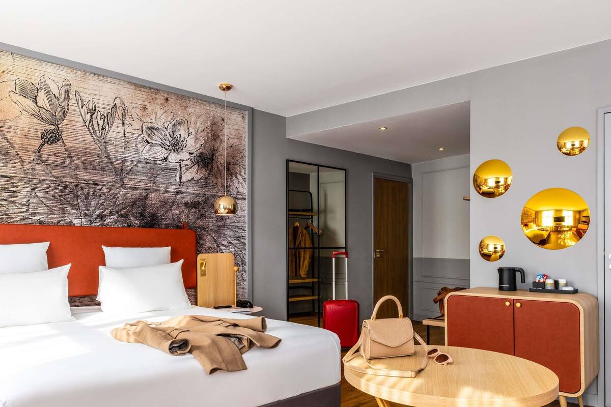 Suite Junior, 1 lit double et 1 canapé-lit | Minibar, coffre-fort, espace de travail pour ordinateurs portables