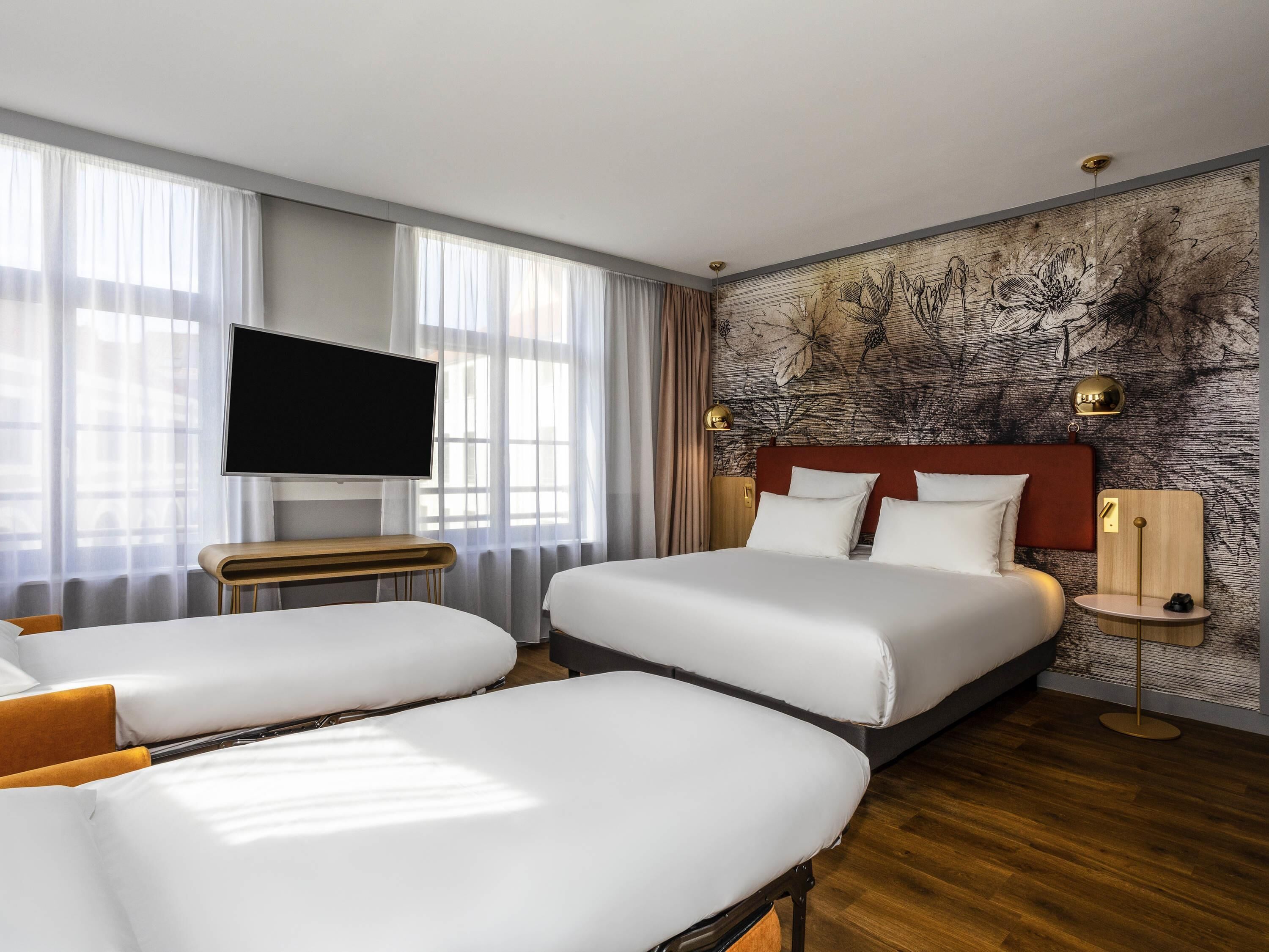 Family Room, Multiple Beds | Minibar, in-room safe, laptop workspace, blackout curtains