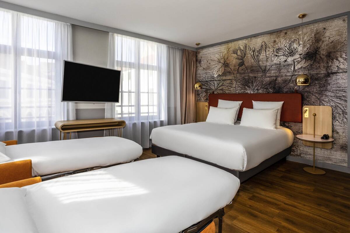 Family Room, Multiple Beds | Minibar, in-room safe, laptop workspace, blackout curtains