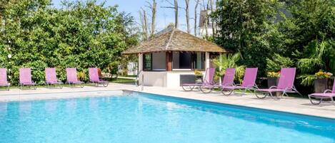 Outdoor pool, open 8:00 AM to 7:00 PM, free cabanas, sun loungers