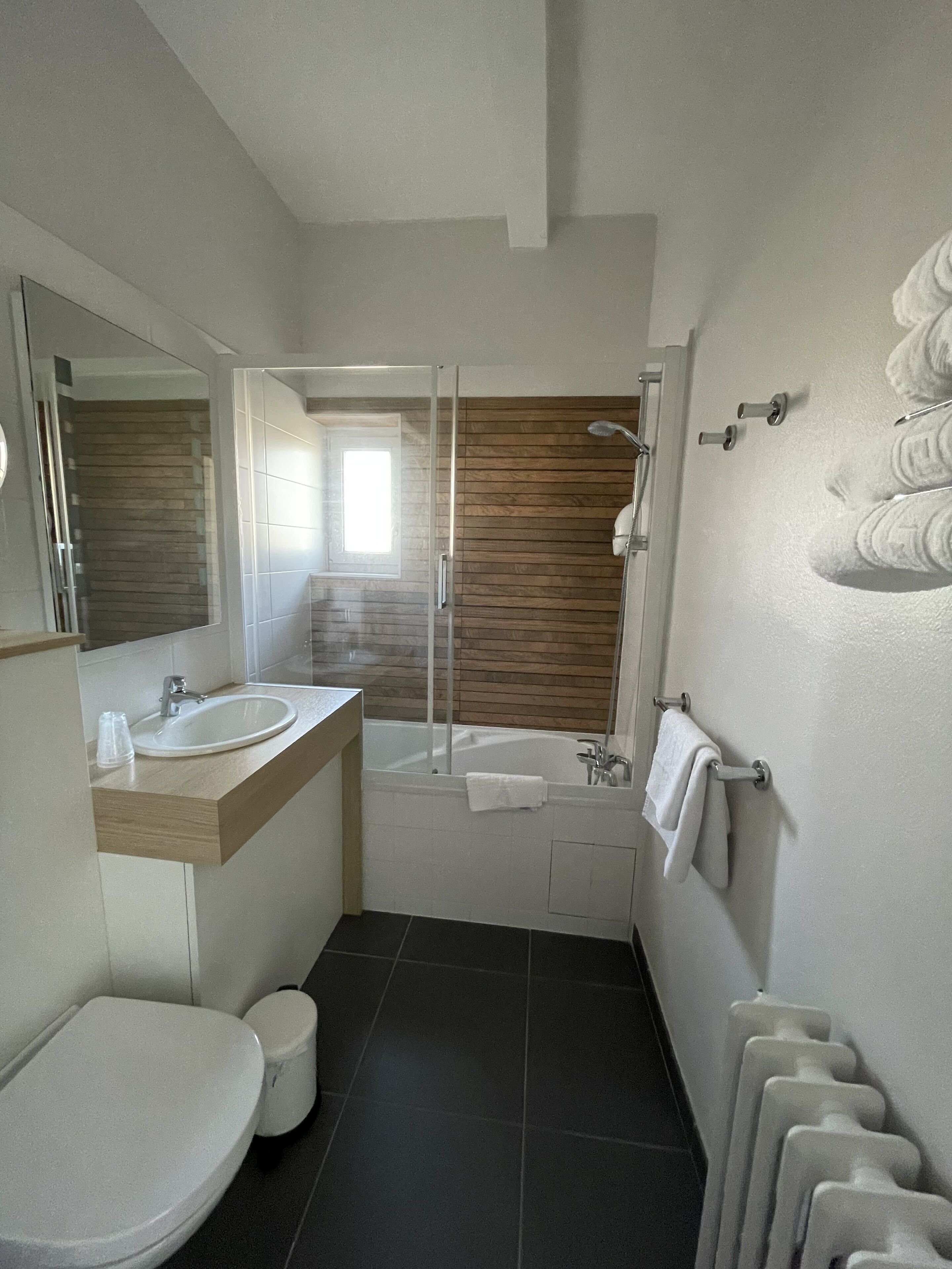 superior triple room | bathroom | hair dryer, towels