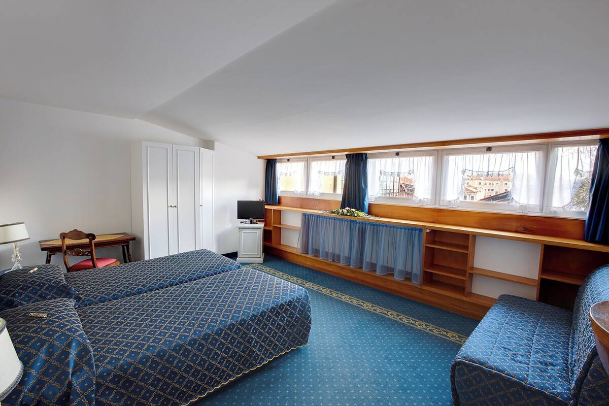 Luxe beddengoed, een kluis op de kamer, individueel gedecoreerd