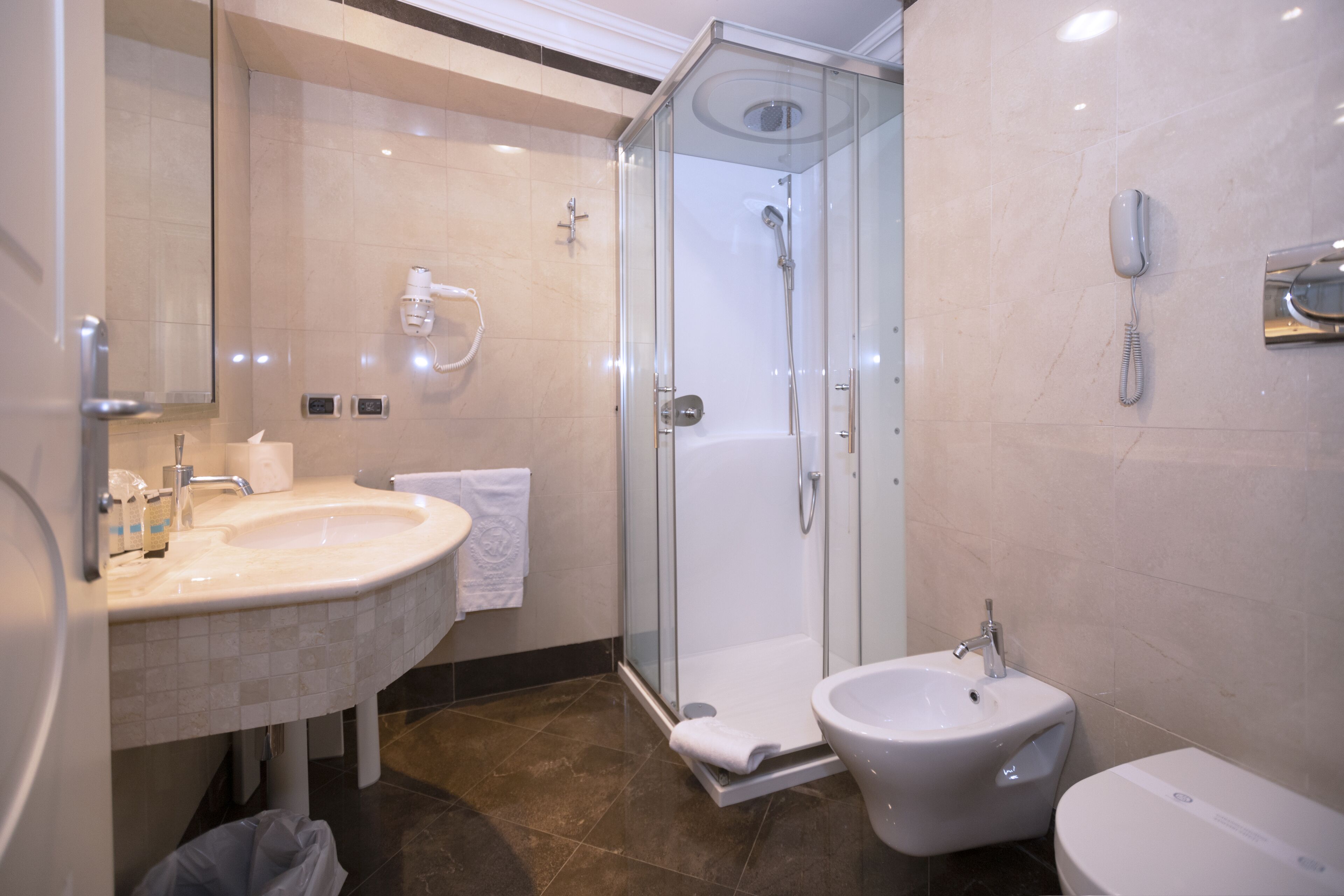 free toiletries, hair dryer, bidet, towels