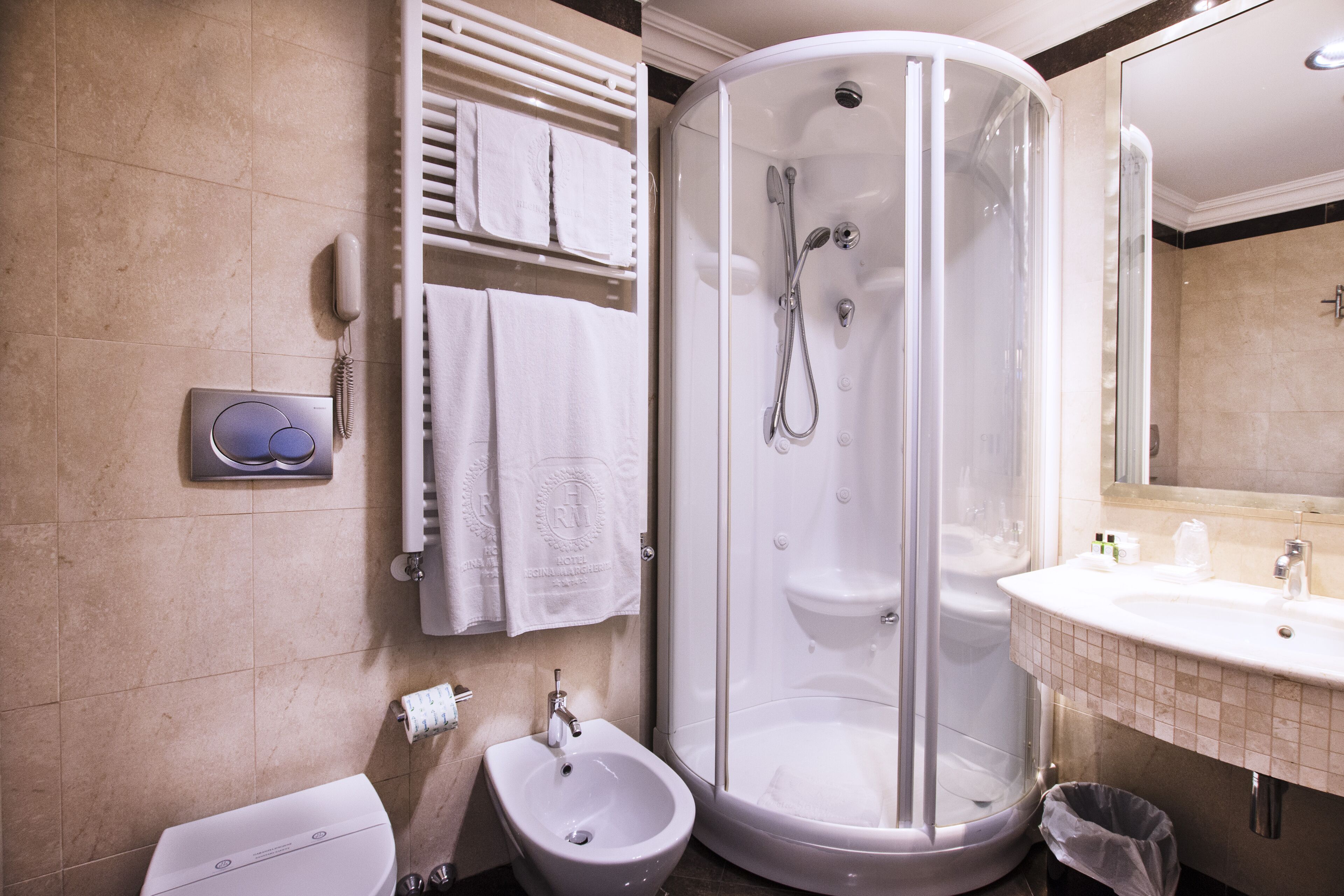 free toiletries, hair dryer, bidet, towels