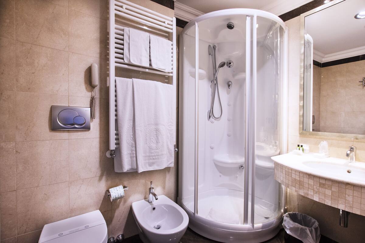 free toiletries, hair dryer, bidet, towels