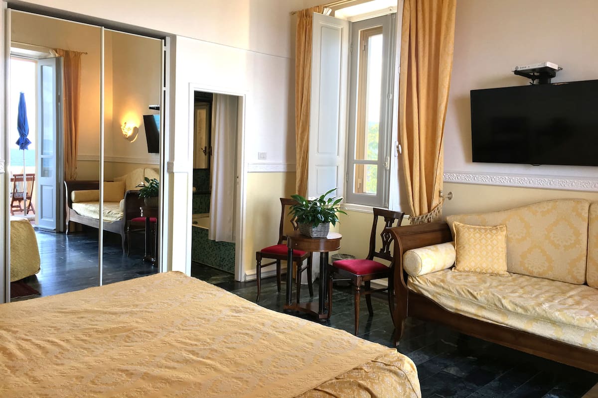Triple Room, Balcony, Sea View | Minibar, in-room safe, free WiFi
