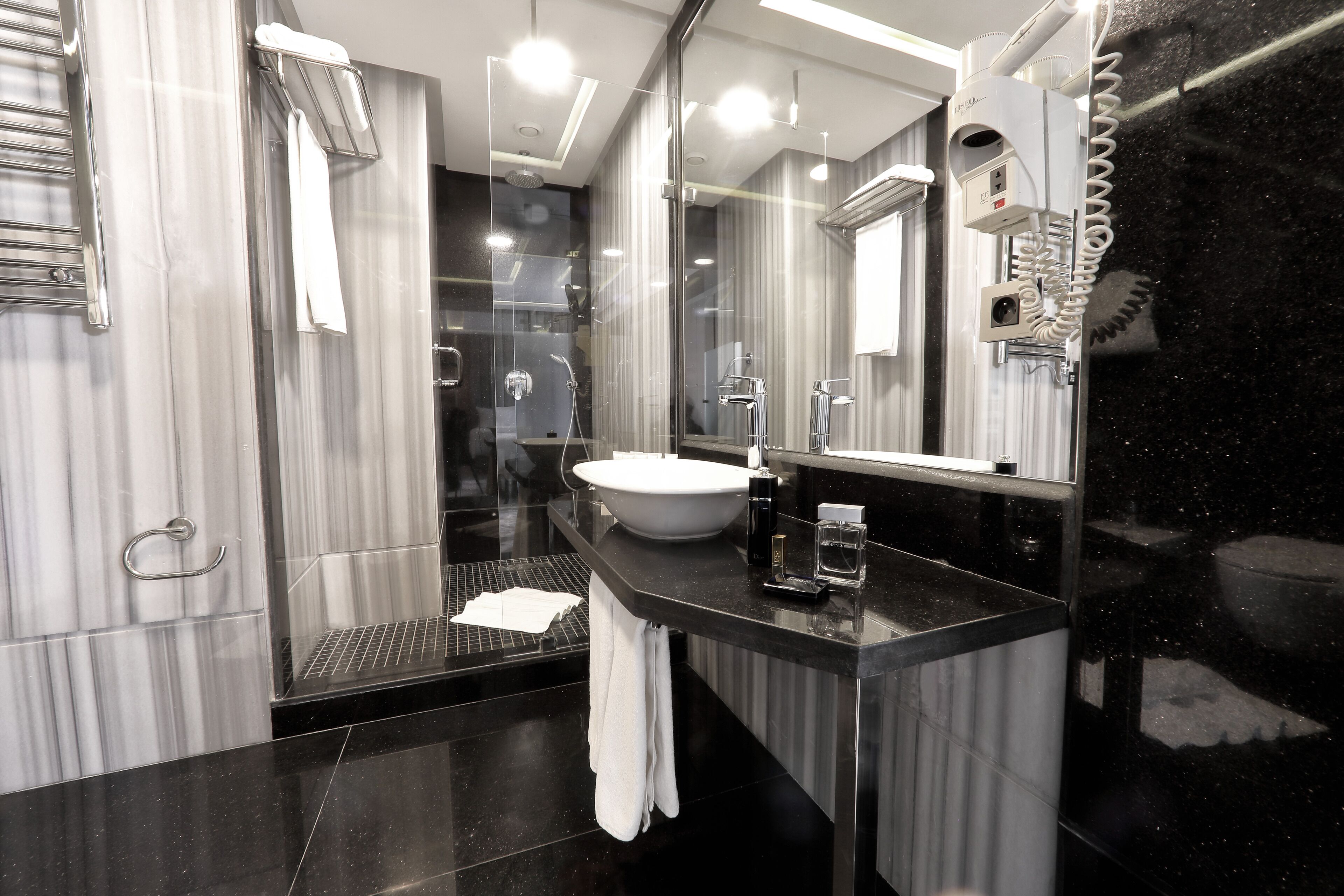 combined shower/bathtub, free toiletries, hair dryer, bathrobes