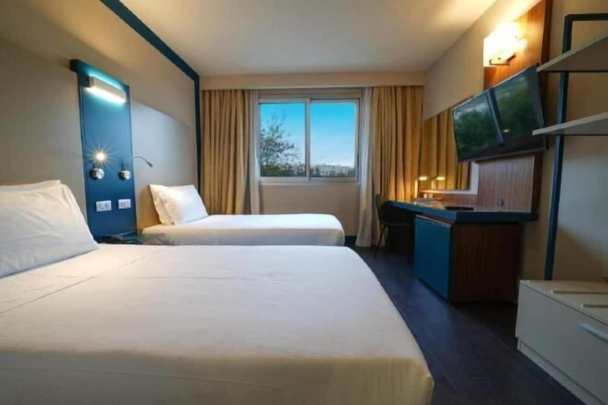 In-room safe, individually decorated, desk, blackout curtains