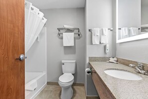 Combined shower/bathtub, hair dryer, towels, soap