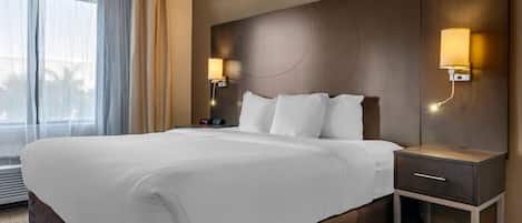 Pillow-top beds, desk, blackout curtains, iron/ironing board