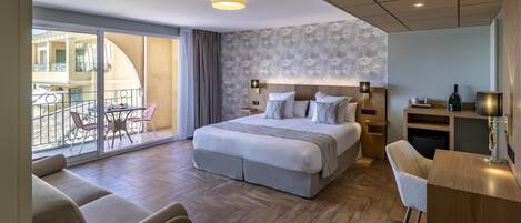 Junior Suite, 1 King Bed, Non Smoking (with Sofabed) | 1 bedroom, in-room safe, individually decorated, desk