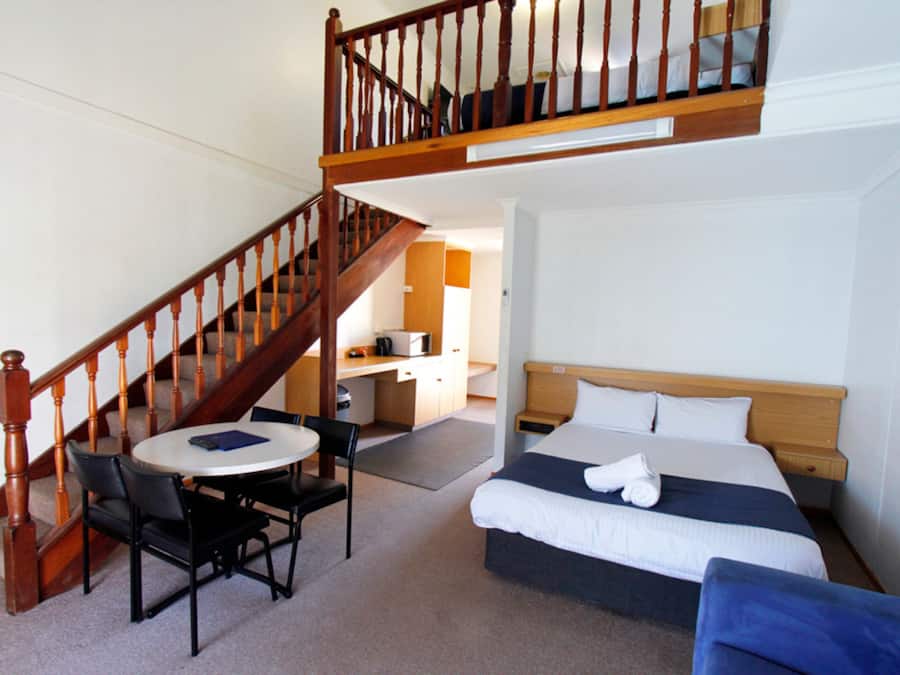 Family Loft, Pool View | Living area | 32-inch TV with digital channels, streaming services