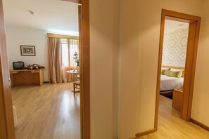 Family Room | Minibar, desk, laptop workspace, blackout curtains