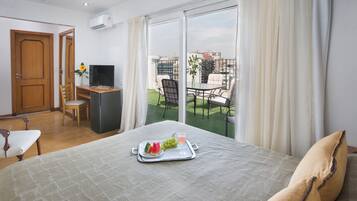 Suite estudio | Ropa de cama de alta calidad, camas con pillow-top y minibar