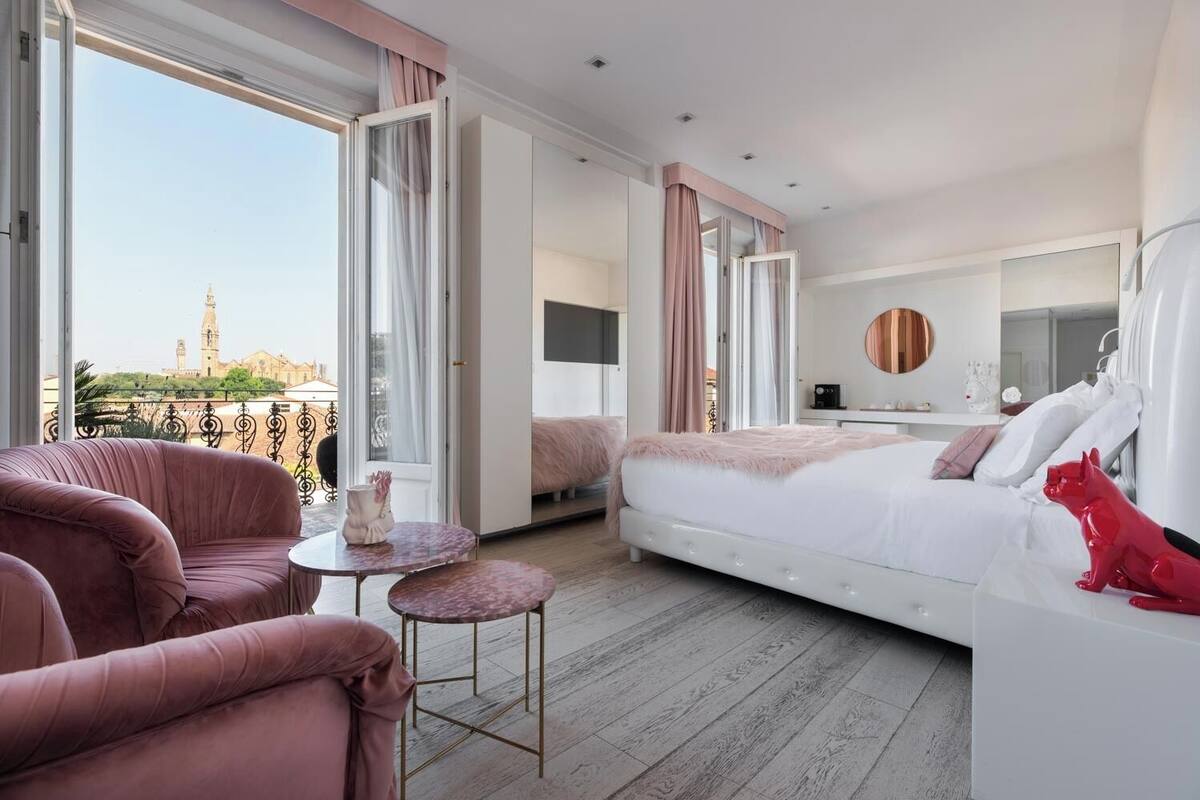 Premium bedding, minibar (some free items), in-room safe, desk