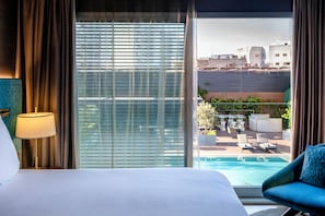 Deluxe kamer, uitzicht op zwembad | Uitzicht vanuit de kamer