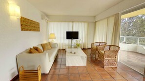 Family Suite, 2 Bedrooms, 2 Bathrooms | Living room | 32-inch LCD TV with cable channels, TV