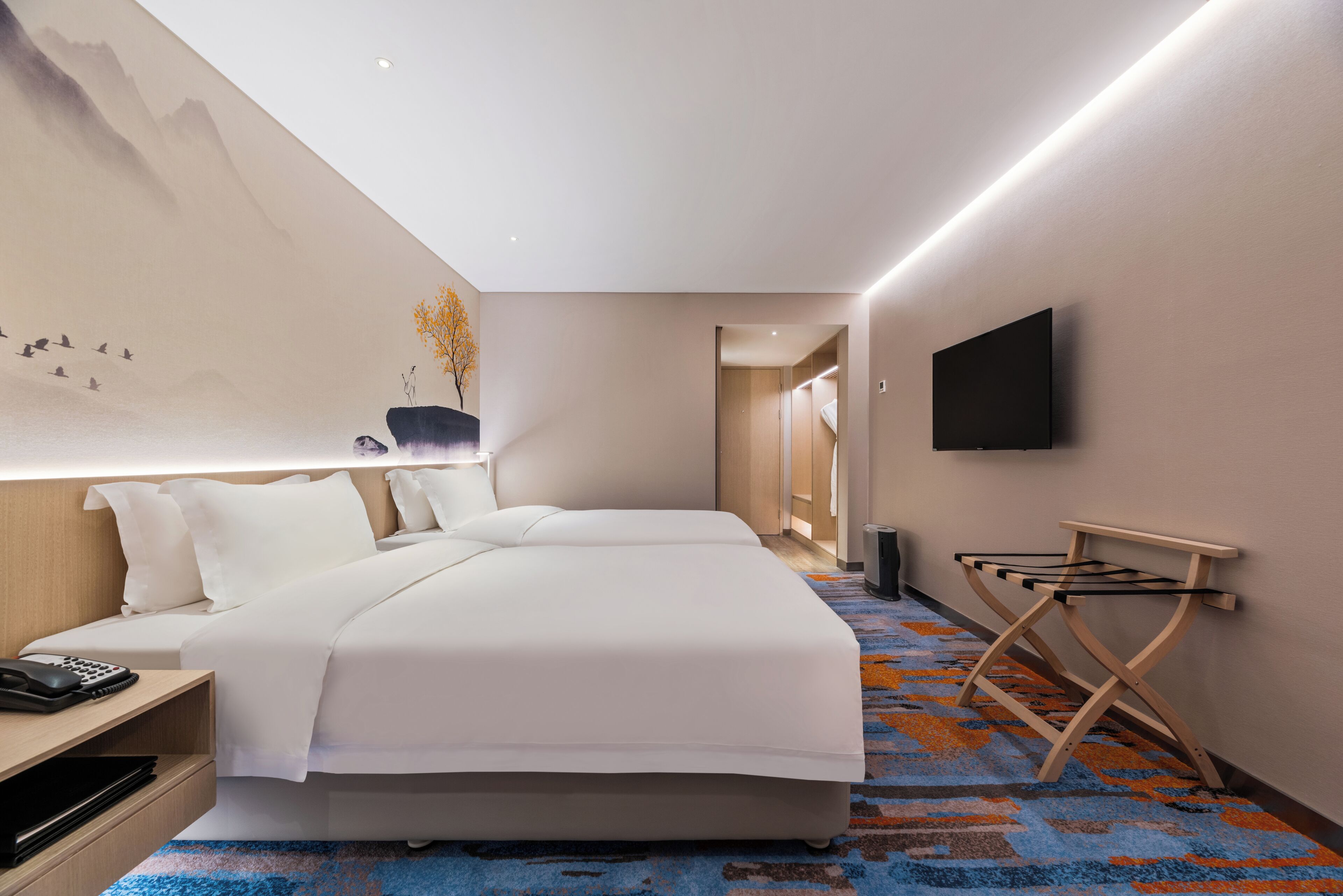 商务双床间 | 迷你吧、客房内保险箱、办公桌、遮光窗帘