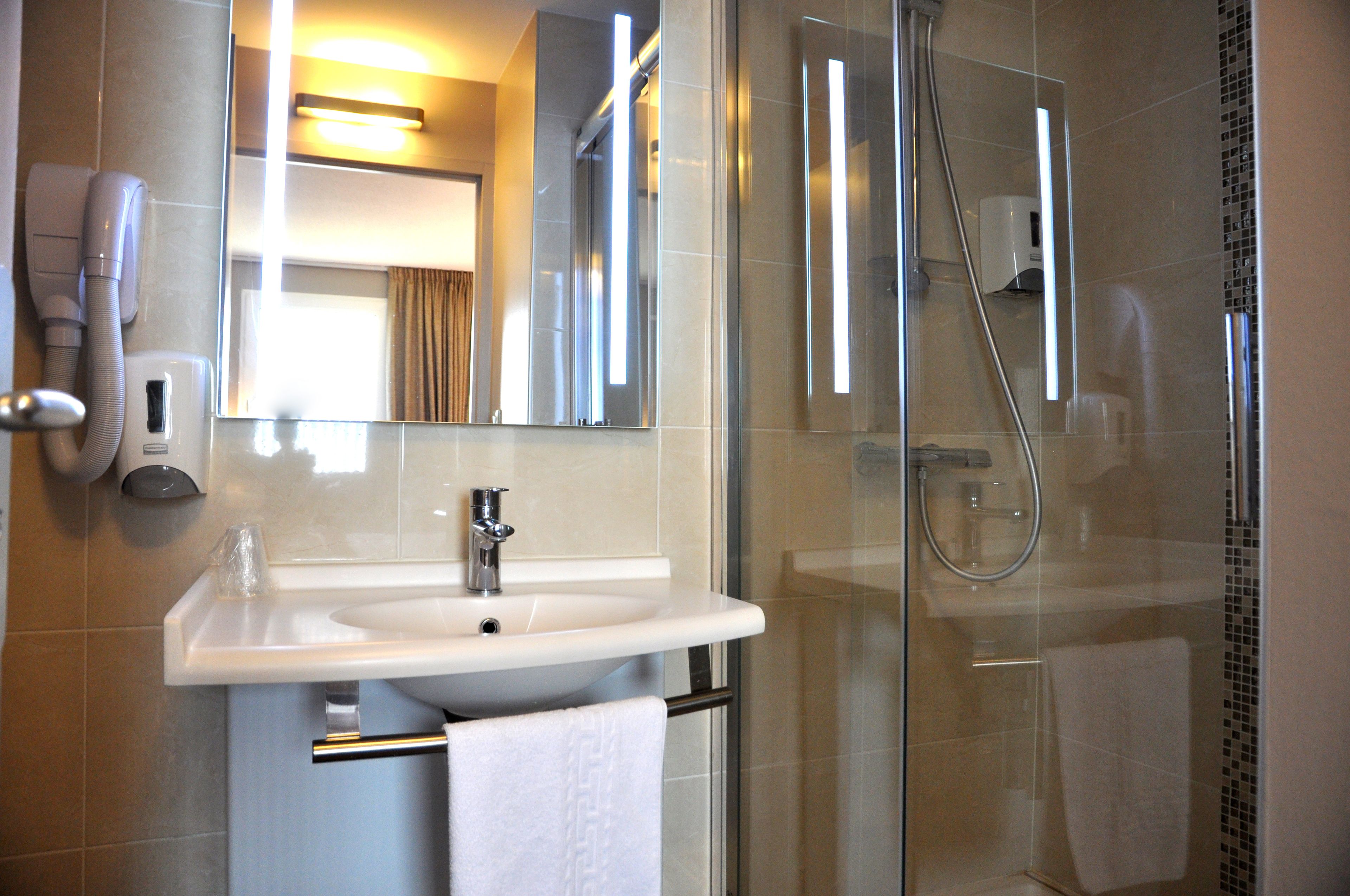 shower, eco-friendly toiletries, hair dryer, towels